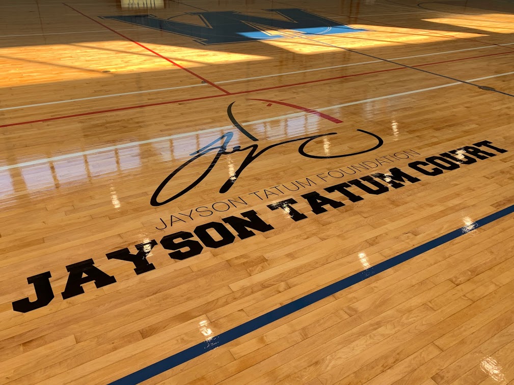 New logo on the floor at Wohl Center