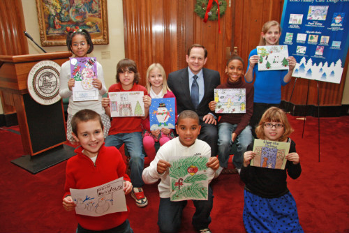 Mayor Francis G. Slay poses with the finalists in his 2010 Holiday Card Design Contest.
