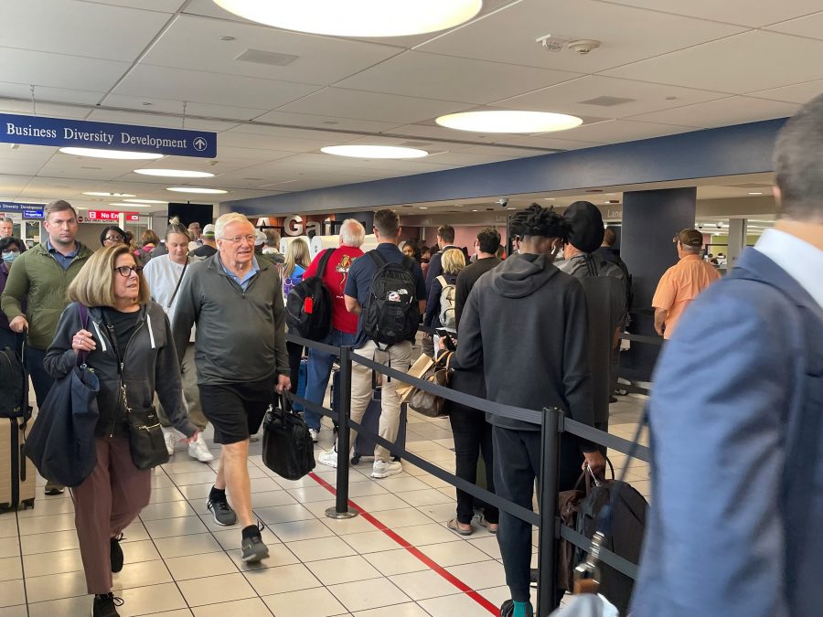 Passengers at going through TSA security at STL-Lambert Airport