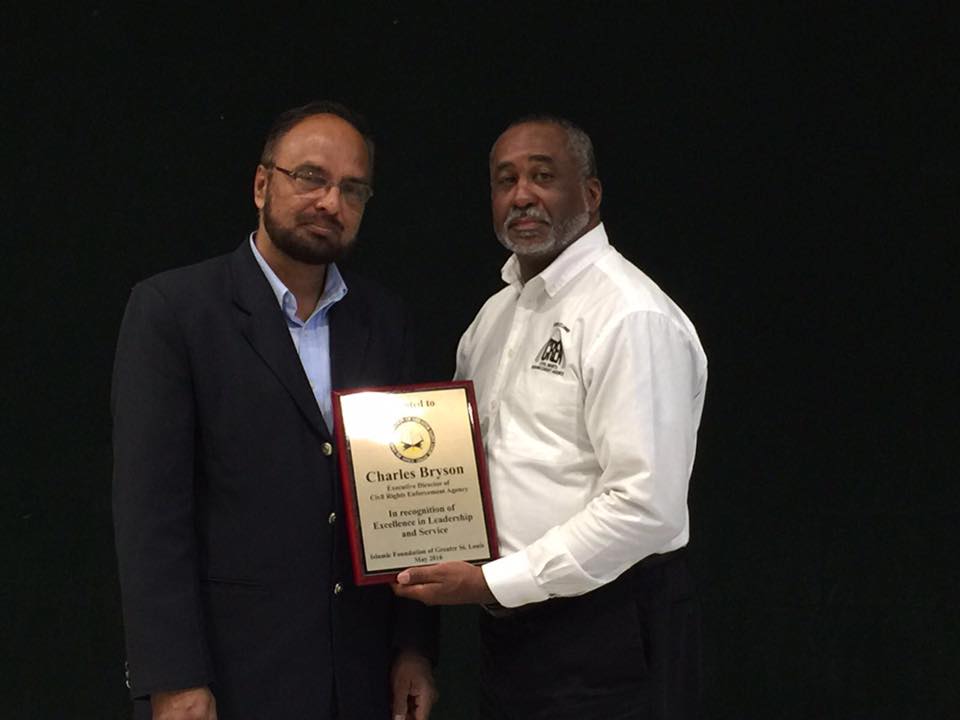 Executive Director Charles Bryson being honored by Dr Helal Ekramuddin, Chairman of the Islamic Foundation of Greater St. Louis