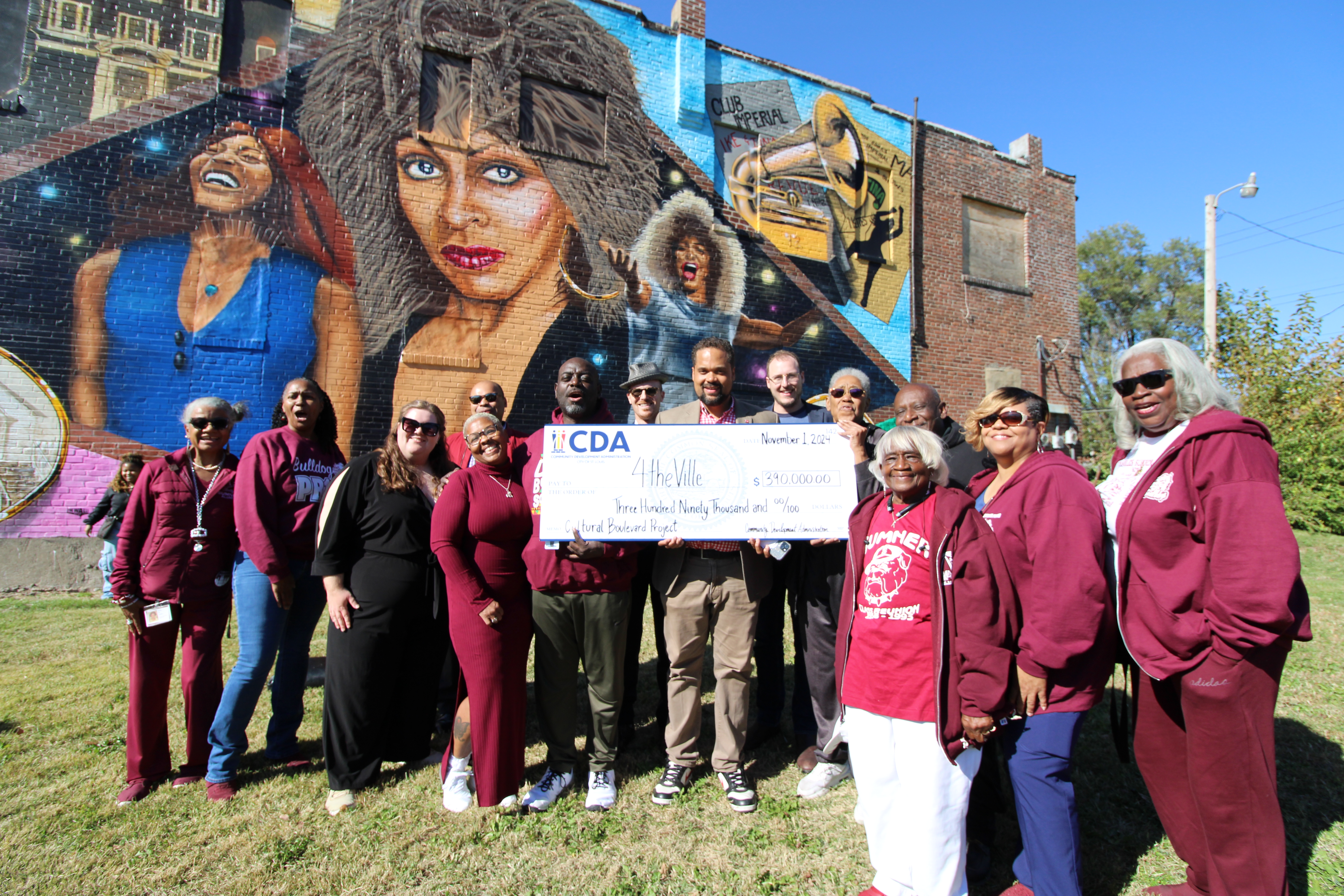 4 the Ville pocket park big check ceremony