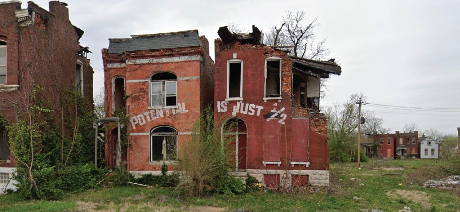 Potential is just half Potential is just half graffiti written on two vacant buildings.