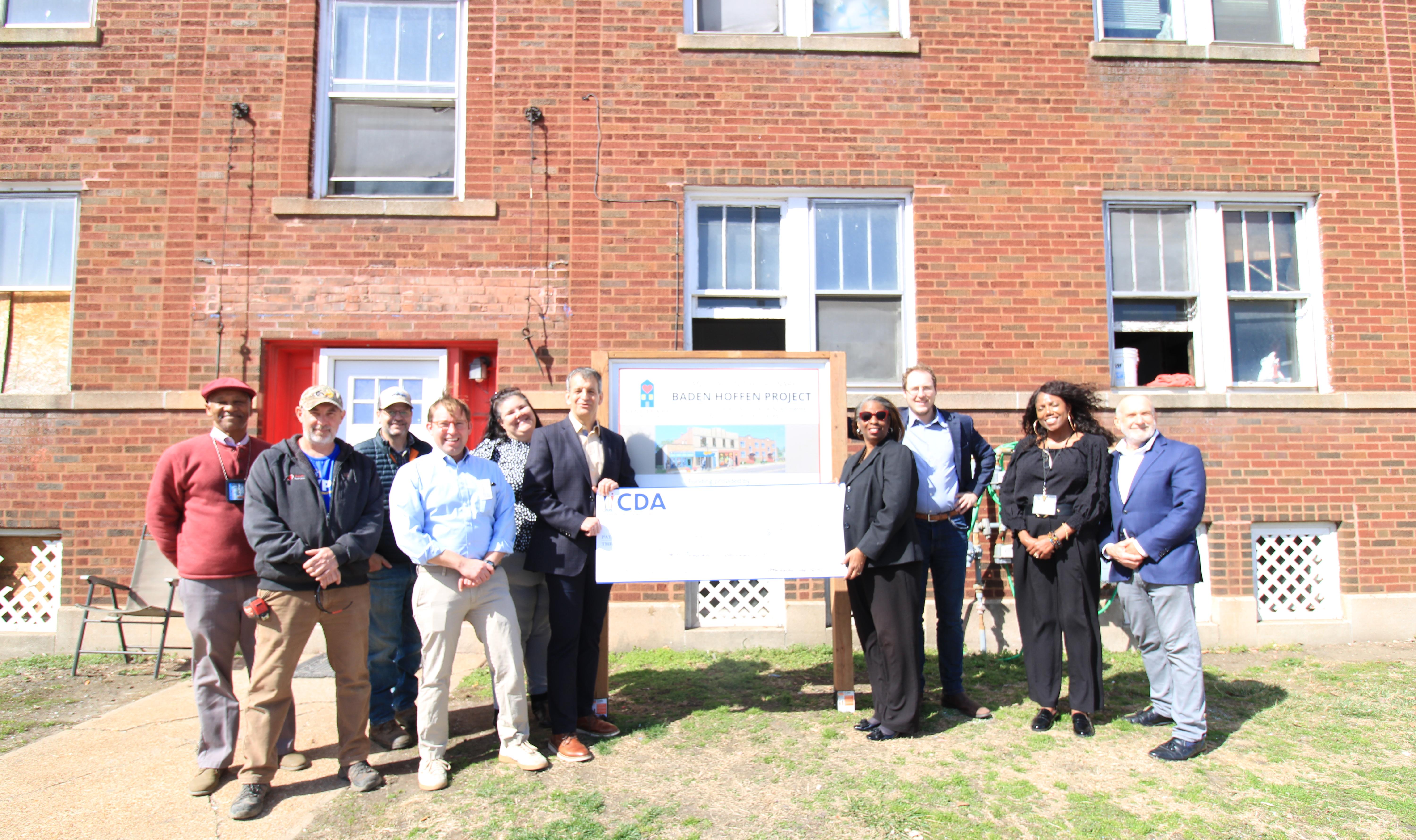 Big check photograph with SITO and CDA staff.