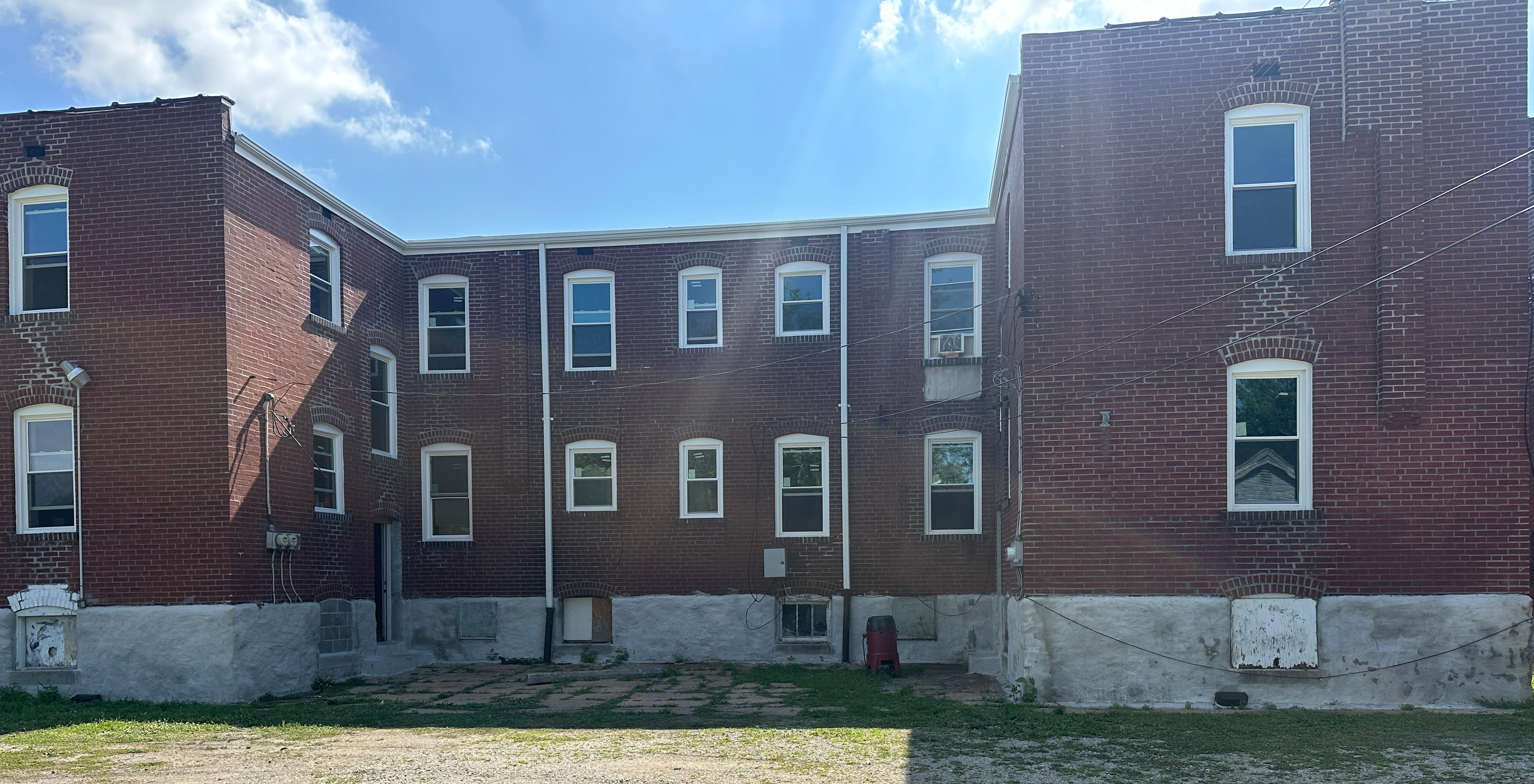 Back of the apartment building along North Broadway.