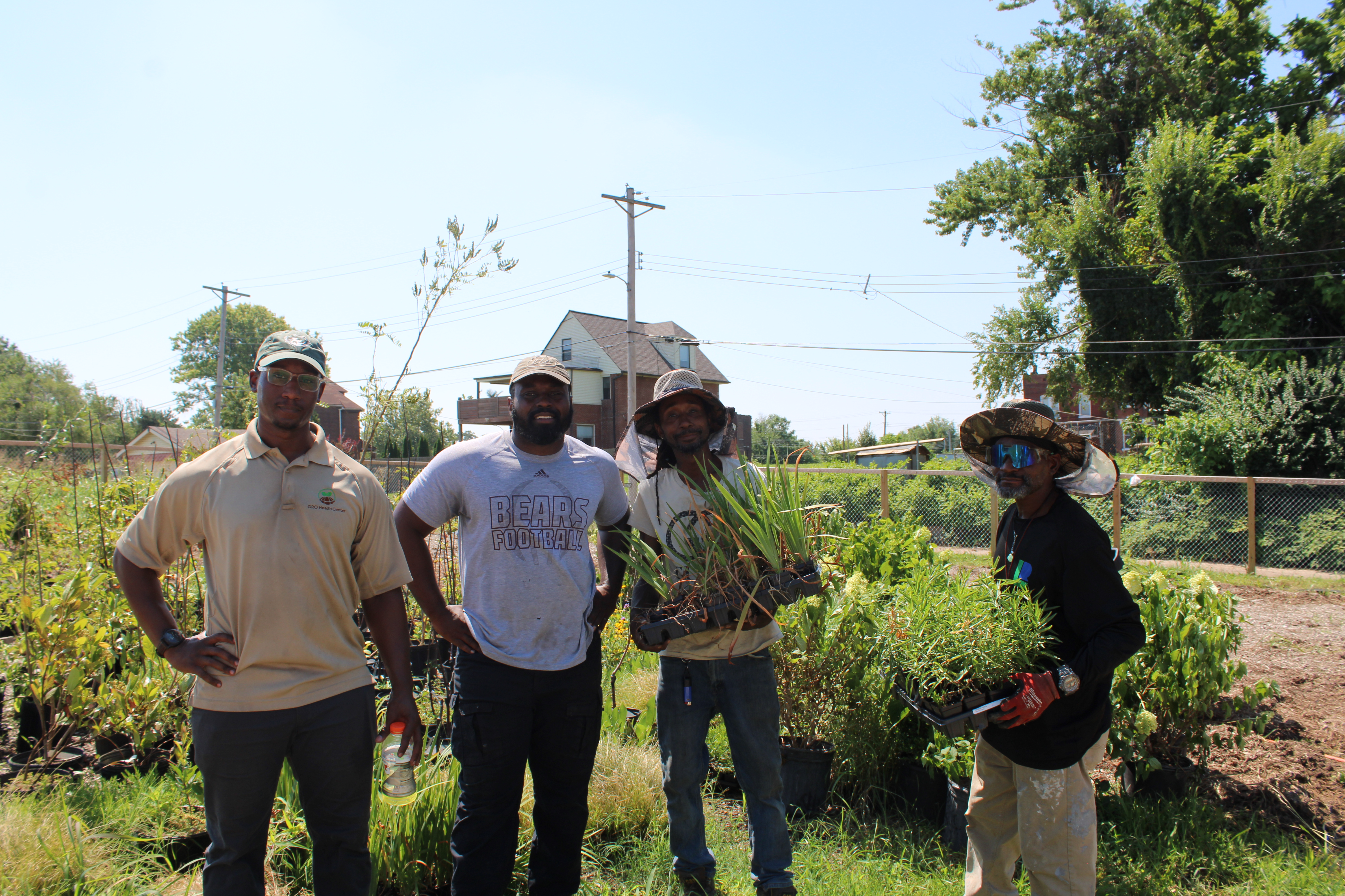 Nashad Carrington and team members tending to the garden.