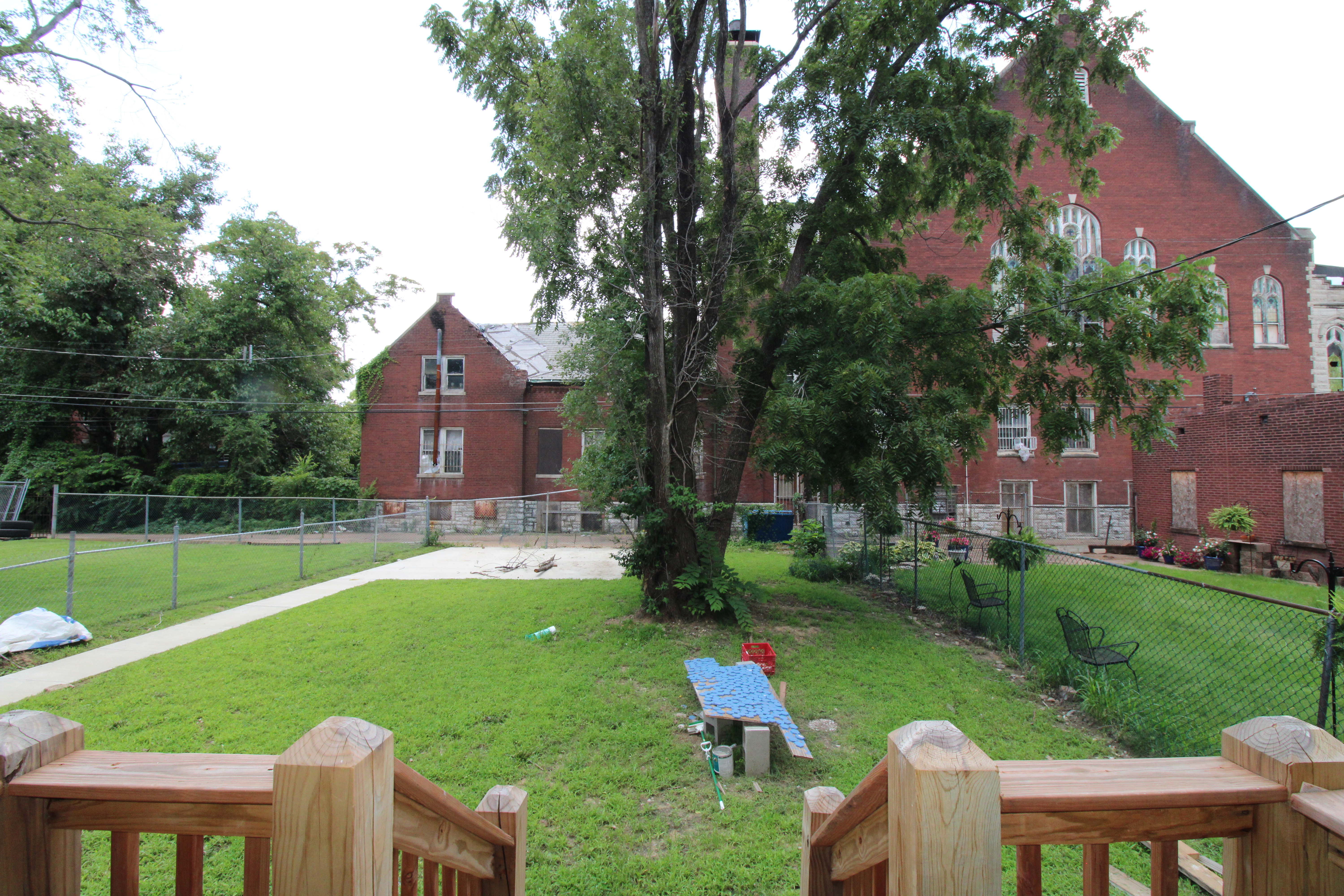 Outside back view of complete 2932 University Street. 
