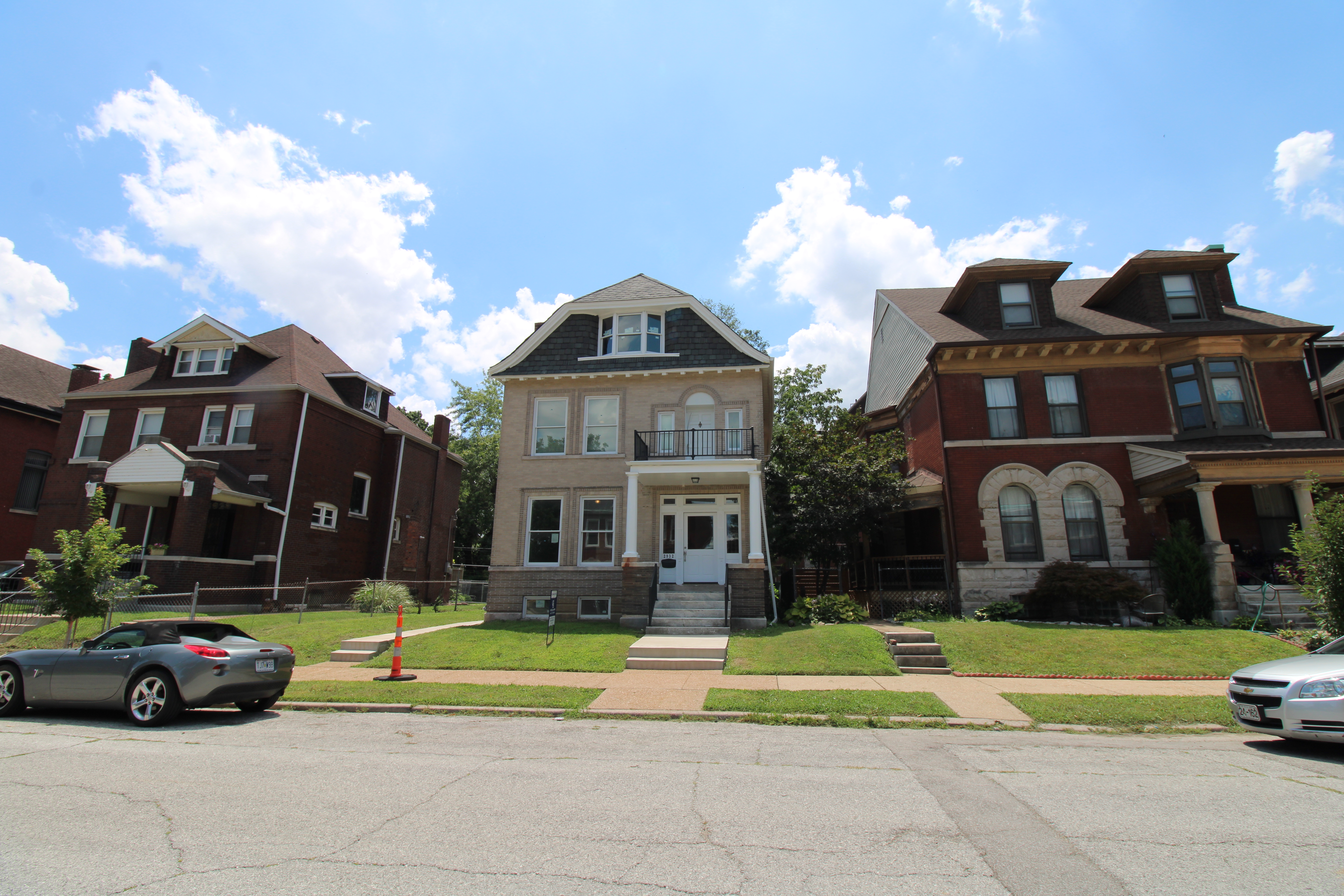 Outside front view of complete 2932 University Street.