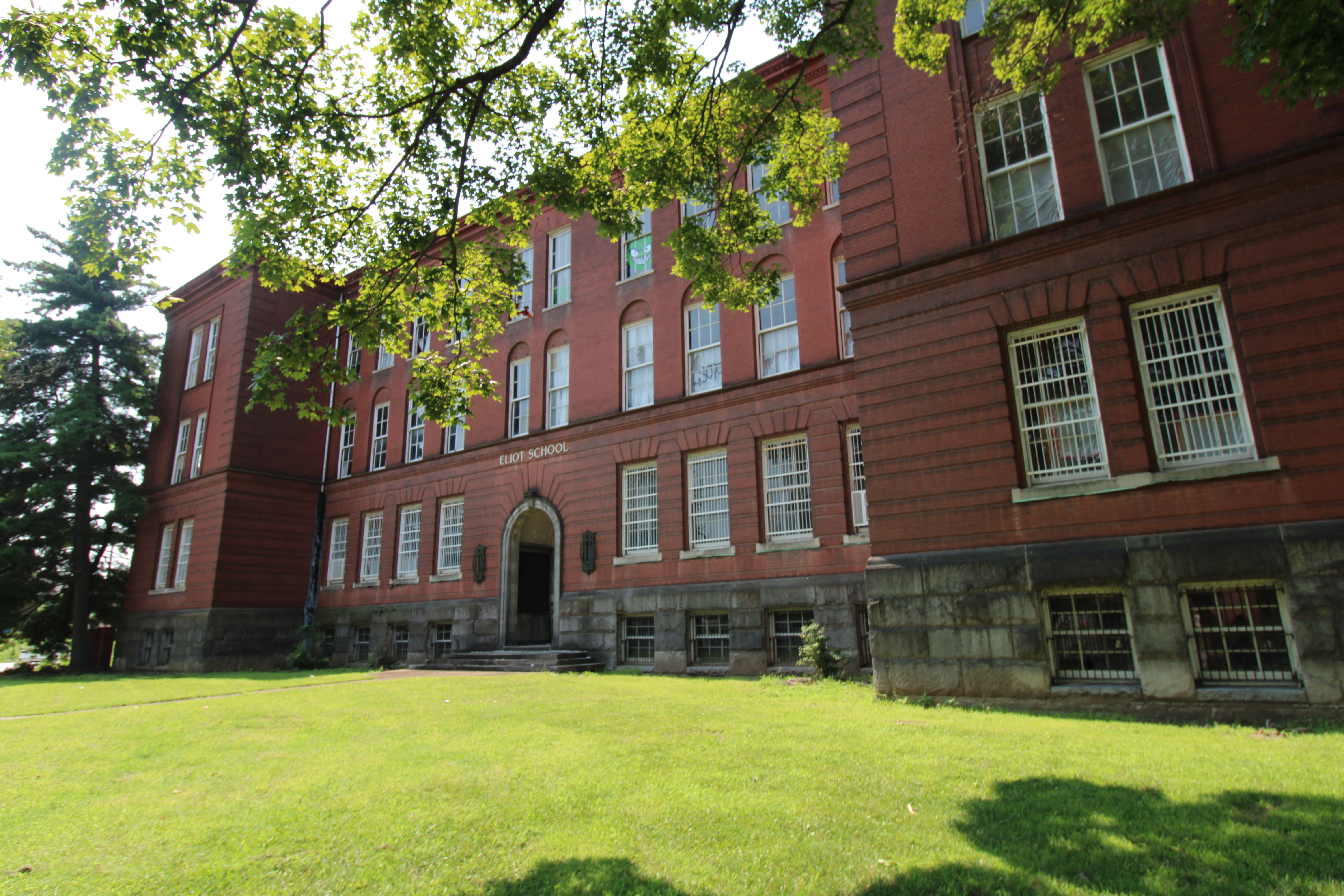 Outside front view of entrance of vacant Eliot Elementary School.