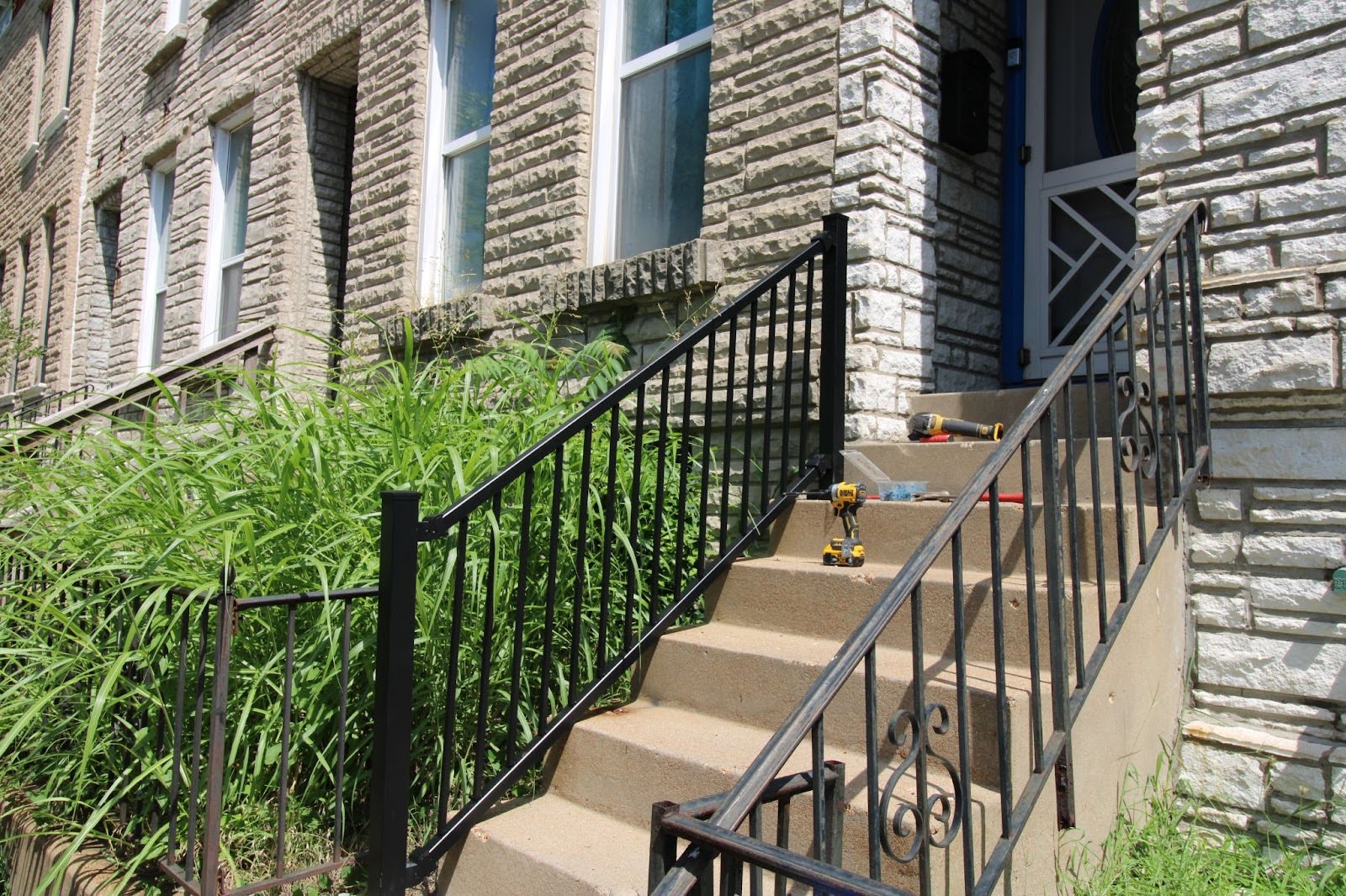 Front view of Ms. Dorothy’s home, where newly installed railings provide easier access to and from the front door.