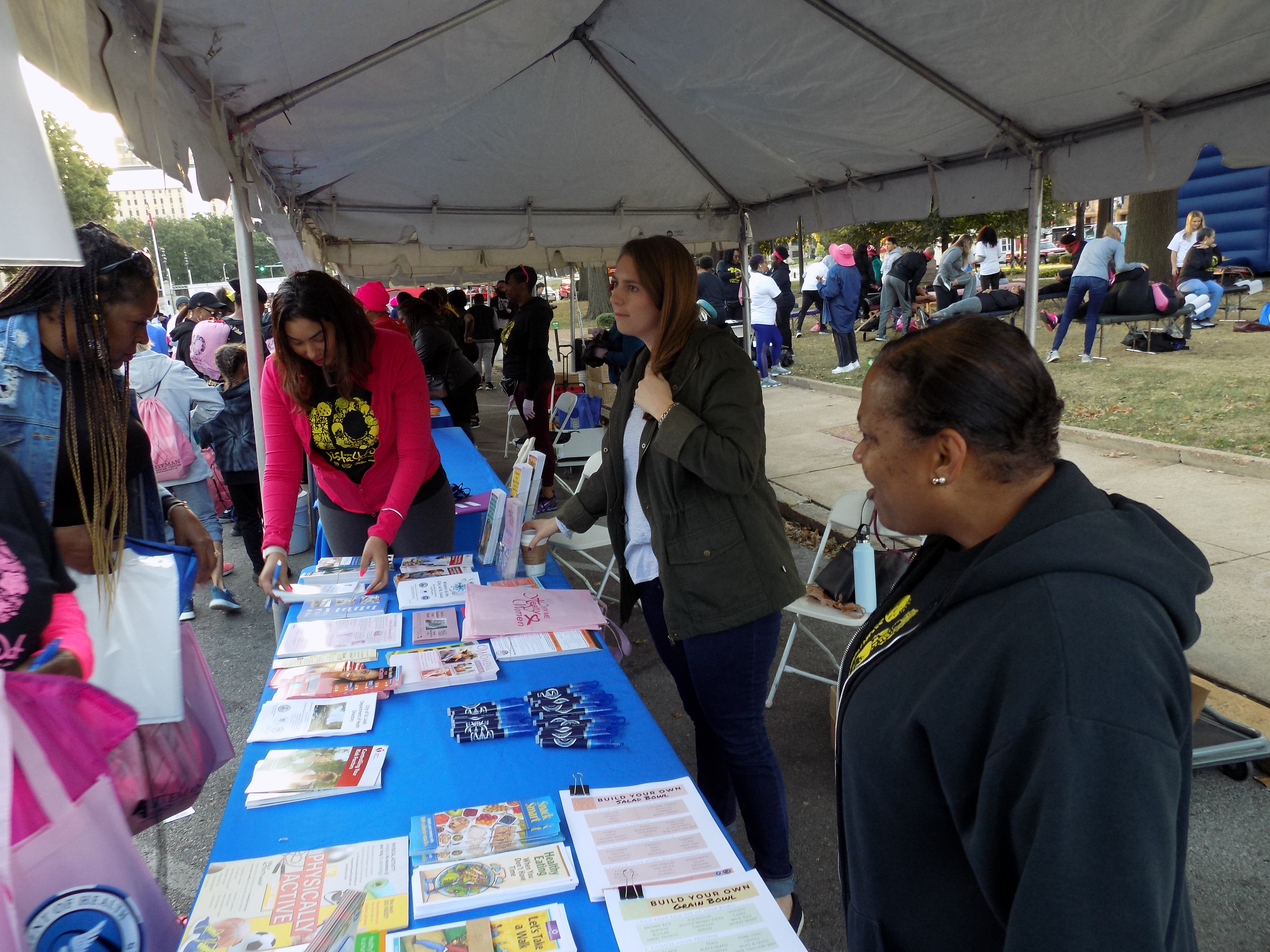 DOH staff answer attendees questions.