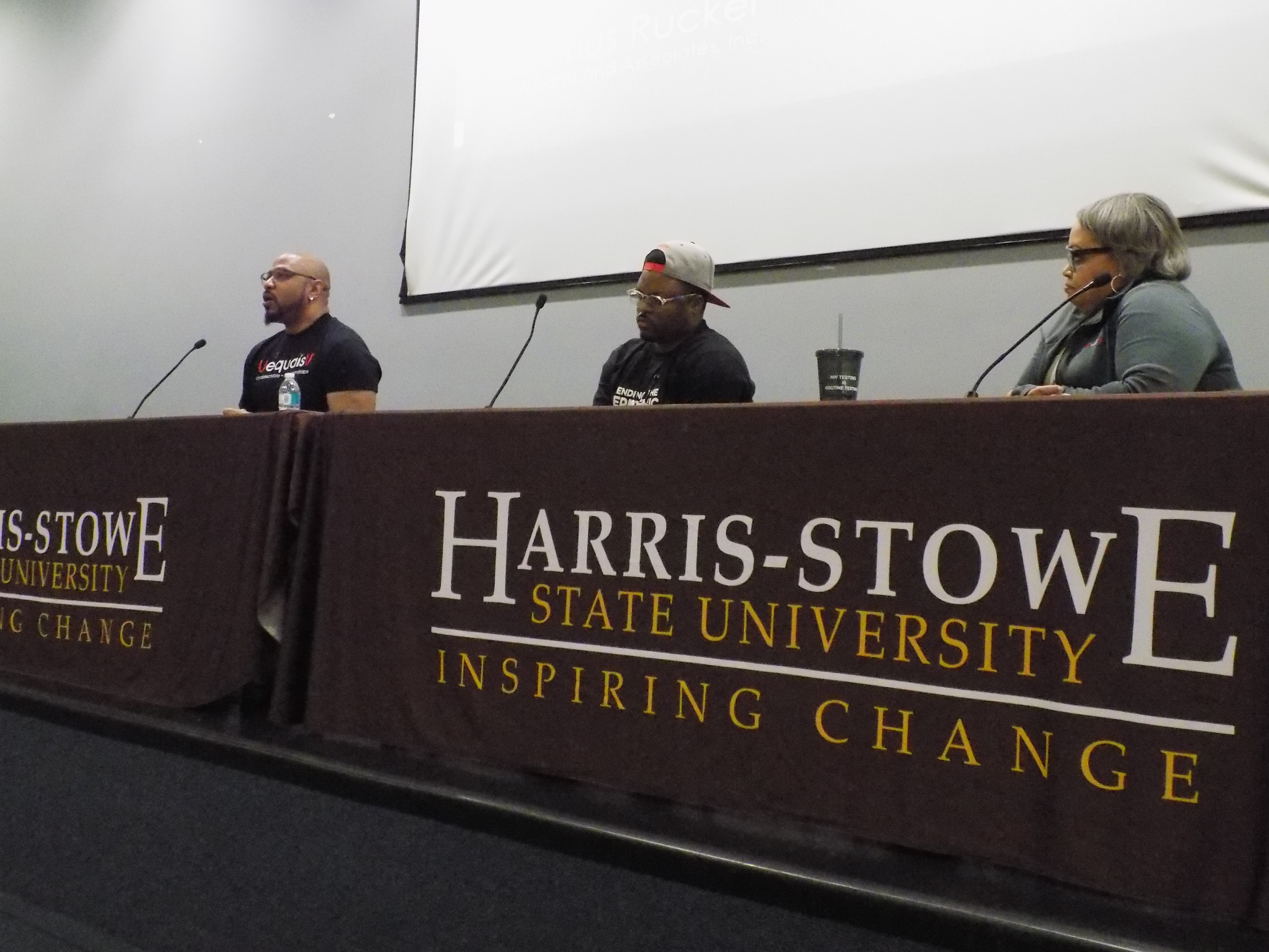 Panelists from community organizations working to end HIV talk about steps needed to assist those with HIV and preventing new cases.