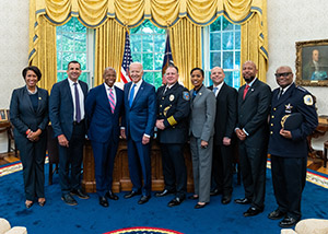 Robert Tracy (fifth from left) with President Biden