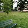 Field with benches over-looking the river