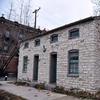 St. Louis Square Park stone home on property