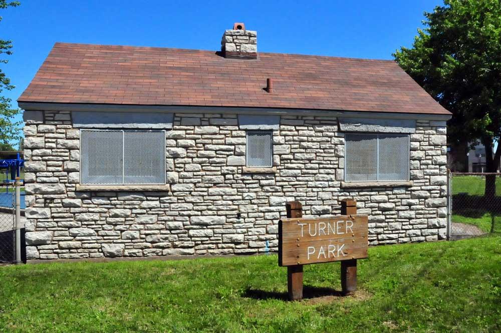 Turner Park Stone Service Building and park sign