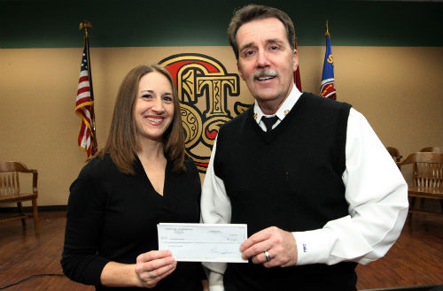 Fire Chief Jenkerson receives donation from Chiodini Family Enterprises d/b/a Zia's on the Hill on Jan. 18, 2012. 