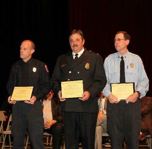 Lifesaving Award to Paramedic Supervisor James Sweaney, Paramedic Crew Chief Bill Miller, EMT Aaron Wiemann and Engine 31A