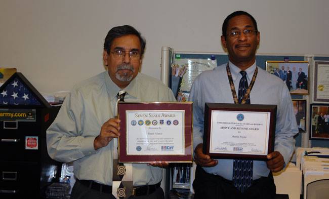 SLATE's Frank Alainz and Marin Payne with ESGR awards