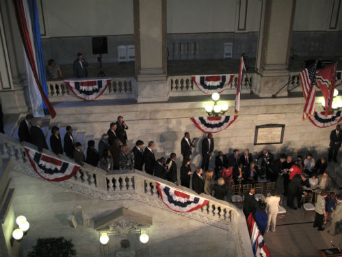 Cabinet members and invited guests begin taking their places for the ceremony.