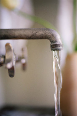 Running water from a residential faucet