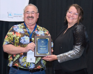 Jim Kopp receiving the Operator’s Meritorious Service Award