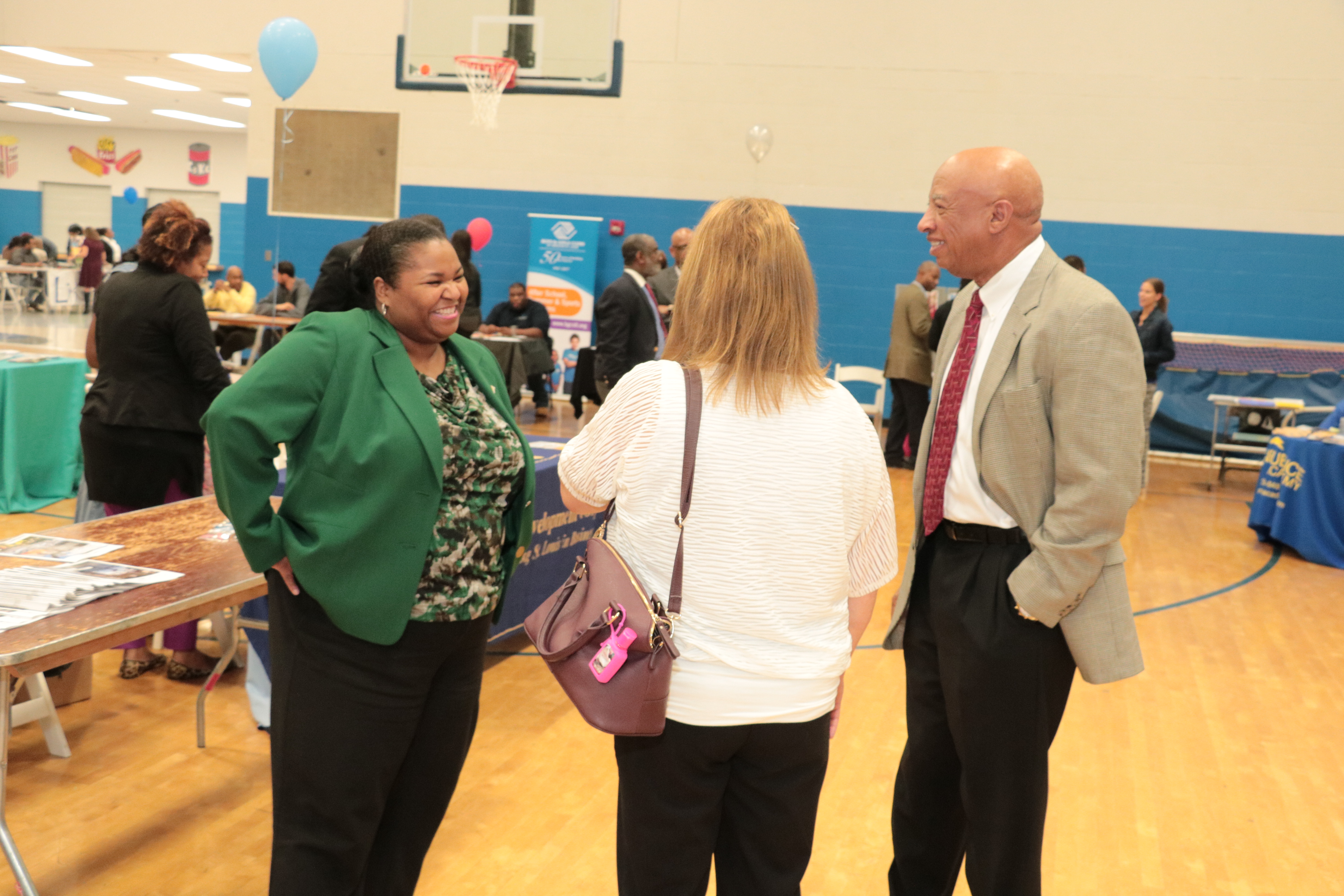 Director Williams learns from residents about their desires for the project.
