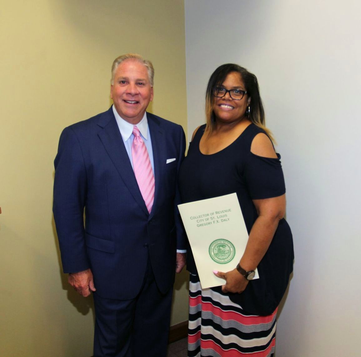 Collector of Revenue Gregory F.X. Daly congratulates Barbara Scales on 5 years of service in the Collector's Office.