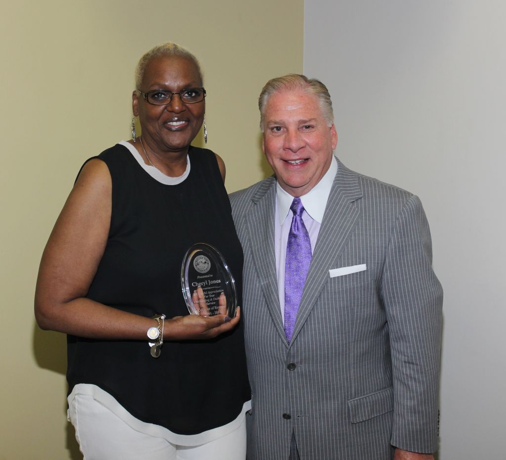 Collector of Revenue Gregory F.X. Daly thanks Cheryl Jones for her many years of service to the people of St. Louis.