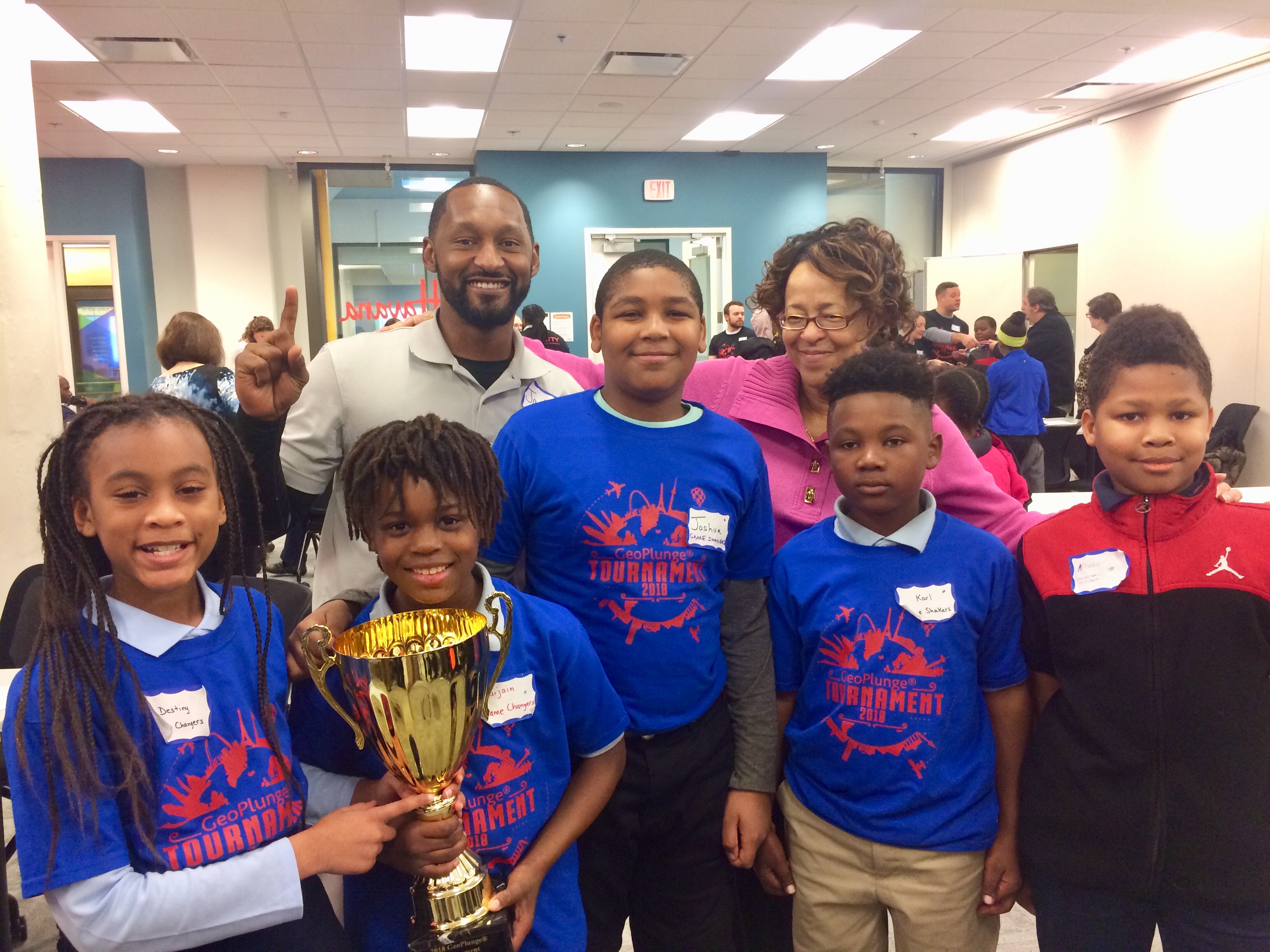 Project Connect Manager, Ja-Mes Watson, and Gateway GIS Director/Webster University Professor, Dr. Roz Norman pose with the 2018 Geoplunge Champs 