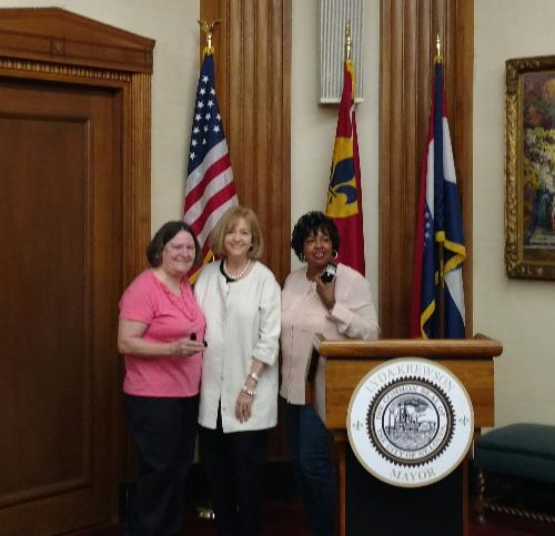 Mayor Lyda Krewson (c) presented 40-year service pins to Sandra Mantia (l) and Melanie Woodward during a brief ceremony at City Hall on Friday, May 19,2017.