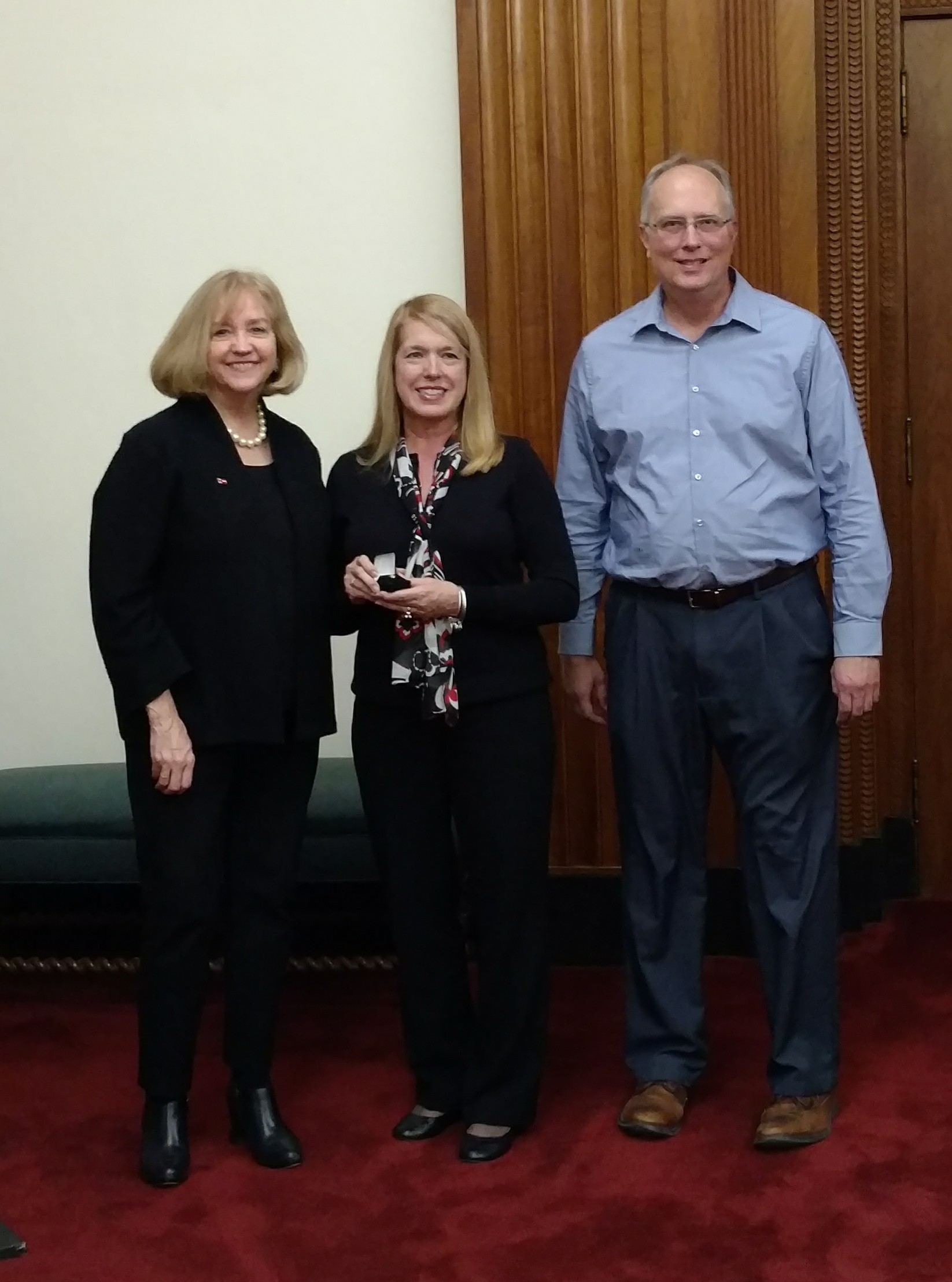 Pictured from left:  Mayor Lyda Krewson, Gladys Kassing and Public Utilities Director Curt Skouby