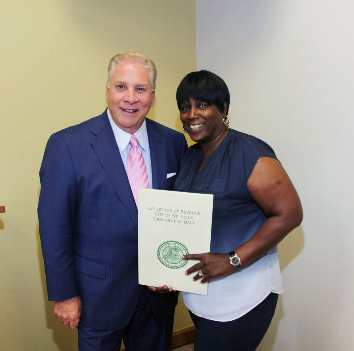 Collector of Revenue Gregory F.X. Daly congratulates Monica Palmer on 5 years of service in the Collector's Office.