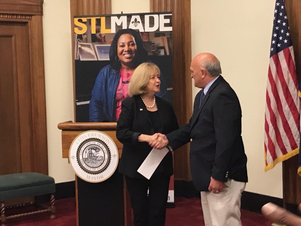 Pictured from left:  Mayor Lyda Krewson, Randy Mourning of the Building Division