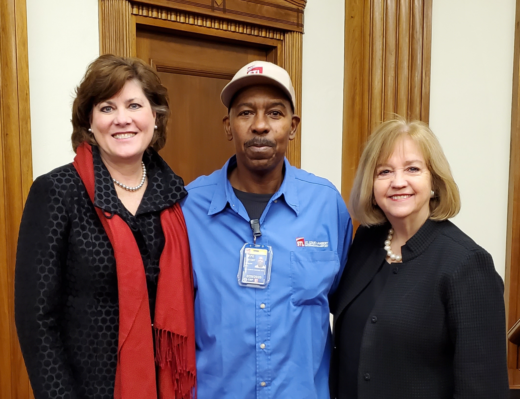 Pictured from left: Airport Director Rhonda Hamm-Niebruegge, Marlon Hill and Mayor Lyda Krewson