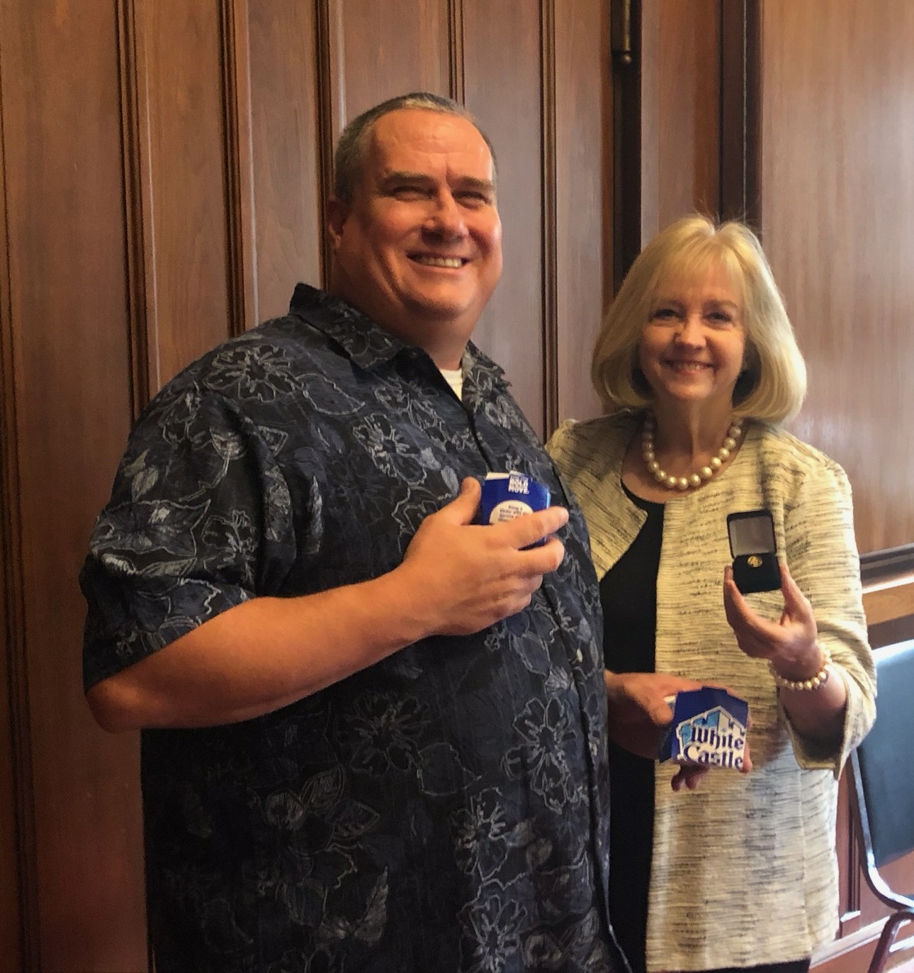 Todd Waelterman receives his 30-year pin and favorite White Castles from Mayor Lyda Krewson before the Cabinet meeting on June 21, 2019.