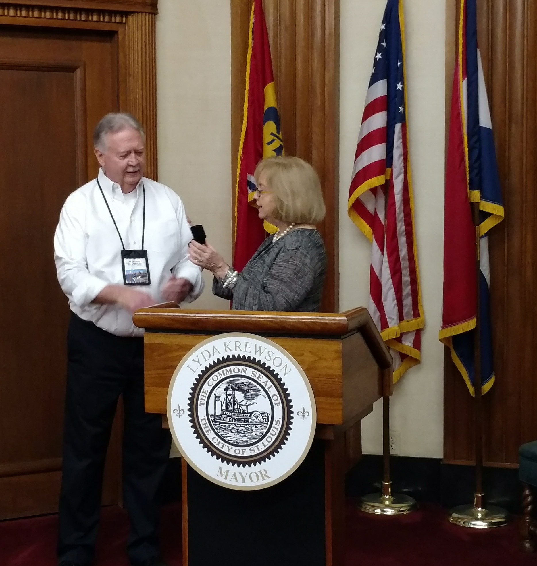 Mayor Lyda Krewson presents 40-year service pin to Ed Ware on Friday, Sept. 15, 2017