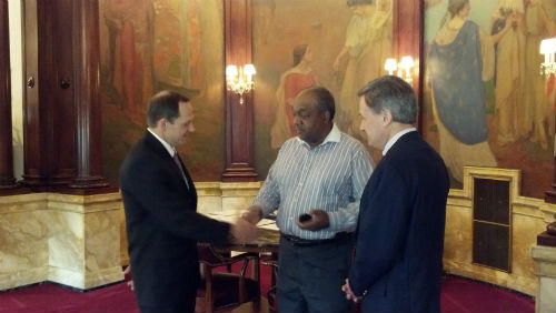 Mayor congratulates Robinson on 40 years with the City.