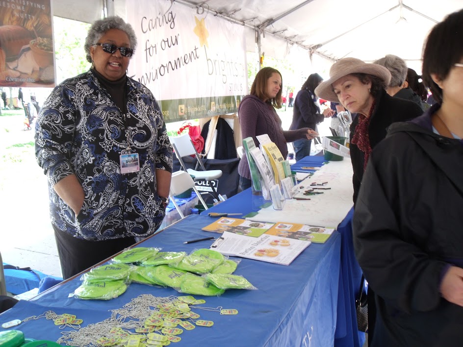 Health Department nurse Bridgett Collins shares information at 2015 Earth Day celebration