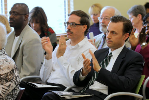 Ian Simmons, Aldermen Craig Schmid and Jeffrey Boyd attend the Fair Housing Month ceremony