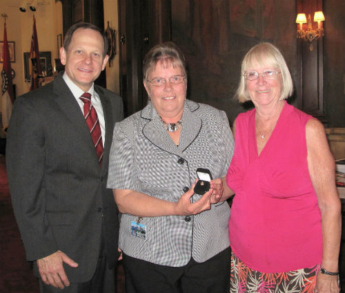 Mayor Francis Slay, Kathy Bess, and Ann Chance at City Hall on Aug. 17, 2012 for the 40-year service pin presentation to Bess.