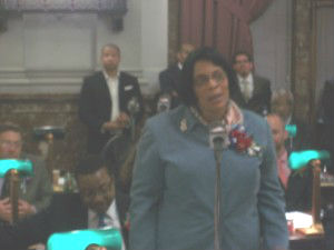 Alderwoman Sharon Tyus greets the Board on the first day of the 2013-14 Session.