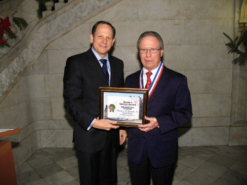 Mayor Francis G. Slay presents Thomas Gerrein Sr. with a Mayor's Service Award.