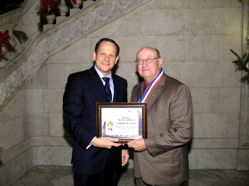 Mayor Francis G. Slay presents the Employee of the Year Mayor's Service Award to Peter Joergensen of the Multigraph Section.
