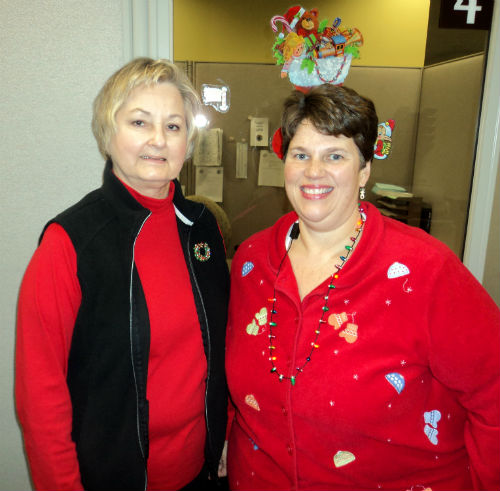 Cynthia and Donna participate in Wear Your Christmas Sweater Day
